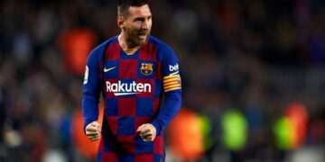 Leo Messi celebrates 700th game