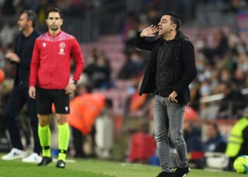 Camp Nou swells with pride as Xavi guides Barca to derby win